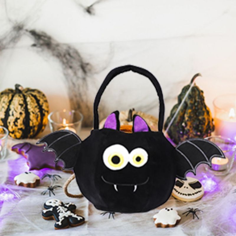 ハロウィンの装飾品はキャンデーの袋を持って幼稚園の活動のカボチャは砂糖の袋のプレゼントの袋の子供の服装の道具を求めます。|undefined