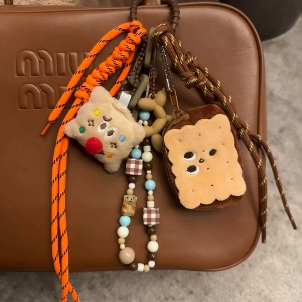 Plush Noodle headset orange brown rope M wind pendant