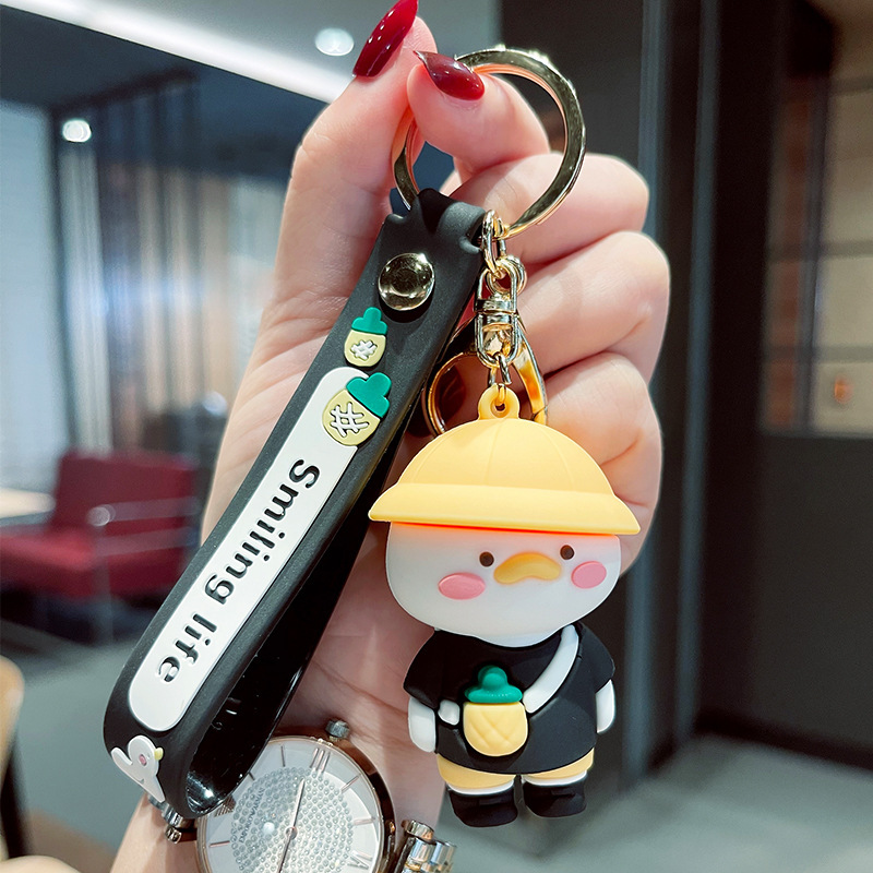 Venta directa de fábrica llavero colgante pequeño muñeca tridimensional llavero de coche mochila escolar colgante puesto al por mayor productos pequeños