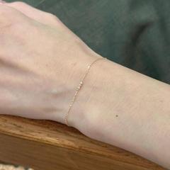 洗練された小さなチェーンの女性は非常に細くて、小さなドリルのブレスレットの小さな気質はシンプルな風で、手飾りを重ねることができます