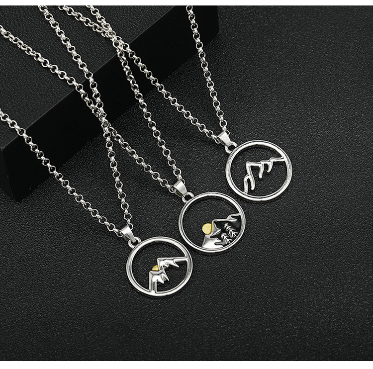 New Round Hollow Mountain Sunrise Couple Necklace display picture 2