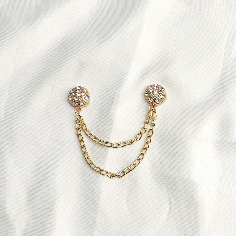 チェーンの磁気はズボンの足を引きずることを防ぎます。金属の磁気は袖口を固定します。