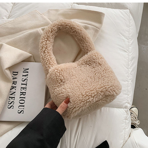  Autumn/Winter New Plush Sheepskin Bag with Woolen Balls, Feminine Vegetable Basket Style Handbag, Soft and Fluffy Round Tube Bag for Women