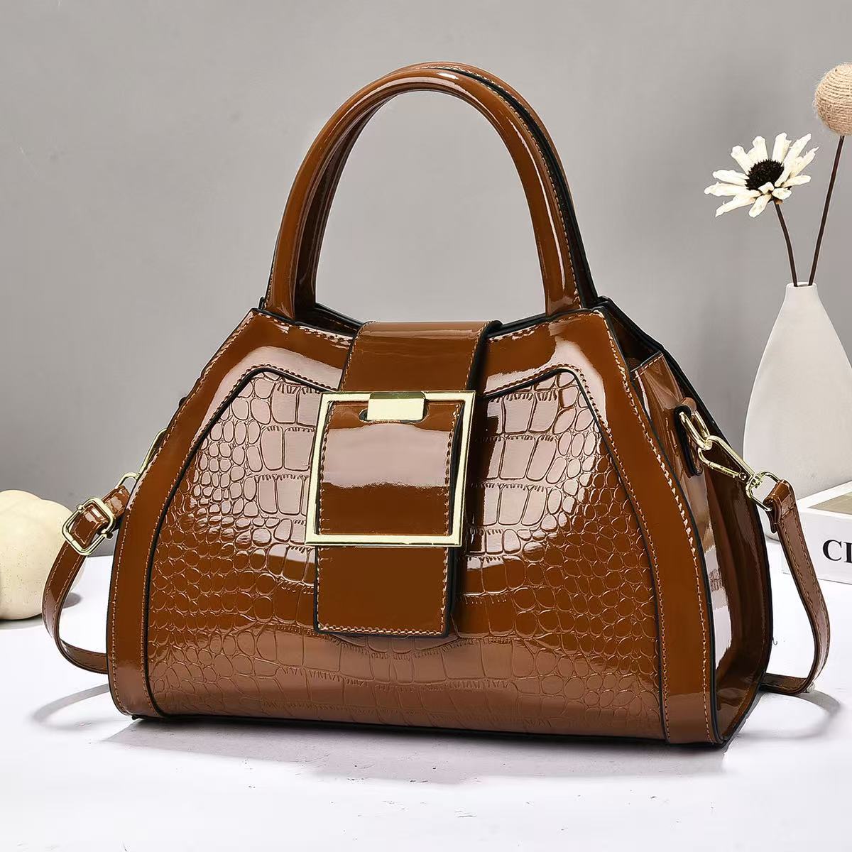 Bolsa de mano de piel brillante de piedra de gran capacidad simple atmósfera mochila de hombro de moda casual bolsas transfronterizas