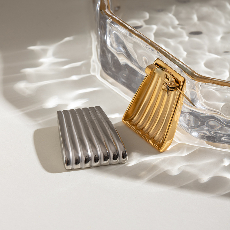 Wanxing estilo europeo y americano de acero inoxidable geometría cuadrada costilla broche femenino de alta calidad nicho de alta gama prendas de vestir joyas transfronterizas