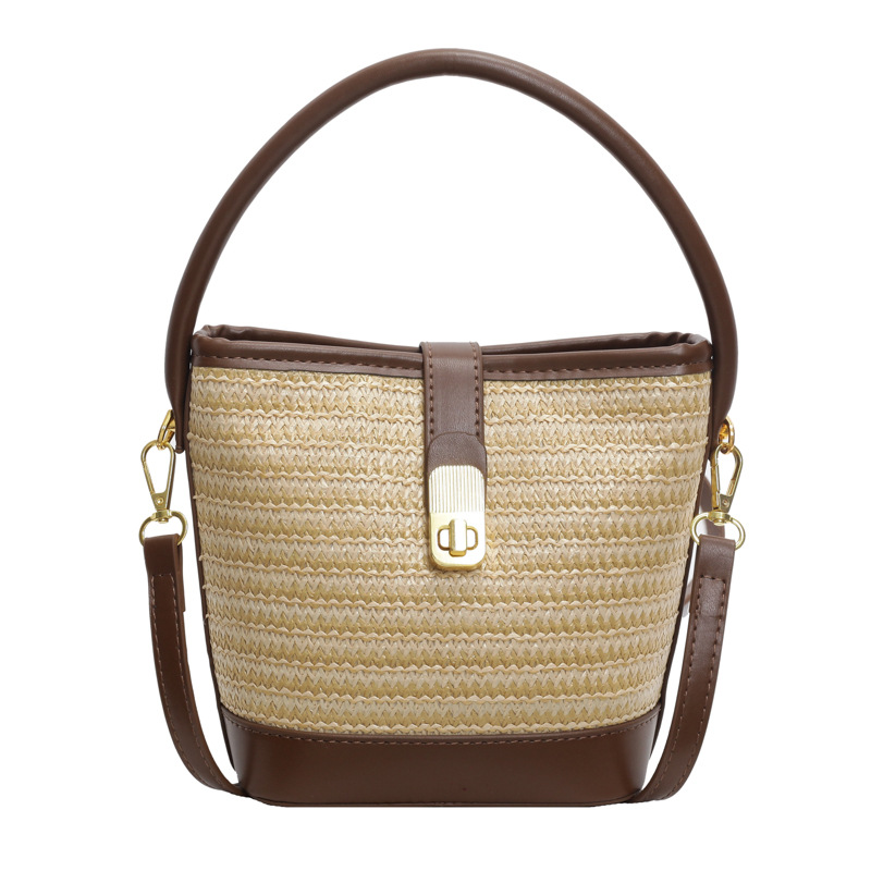 Verano popular bolso de cubo de mano super caliente para mujeres 2025 nuevo estilo de moda simple tejido de alta sensación de hombro mochila