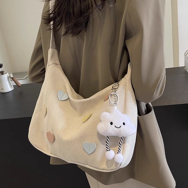 帆布包女2025新款潮秋冬简约百搭大容量单肩包休闲通勤斜挎饺子包|undefined