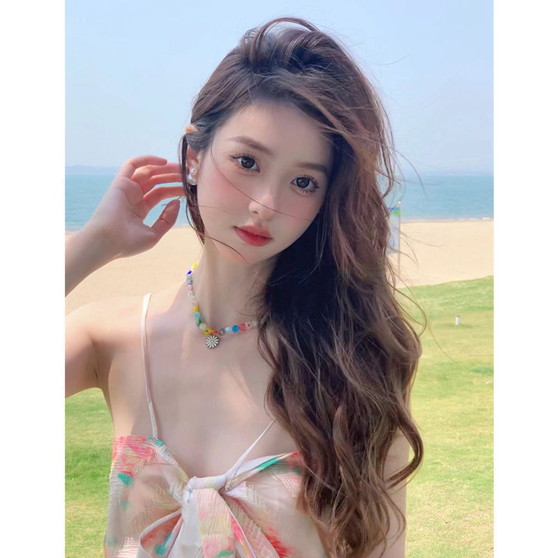 夏の新しい甘くてスパイシーなスタイルのストラップ付きショートサスペンダーレディース2025タイスタイルニッチ花柄ウエストレストップ|undefined