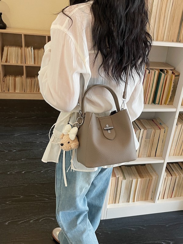 Bolsos de diseño de moda portátil cubo de agua, bolsos de bebé, nuevos patrones de litchi, bolsos de alta calidad prácticos.