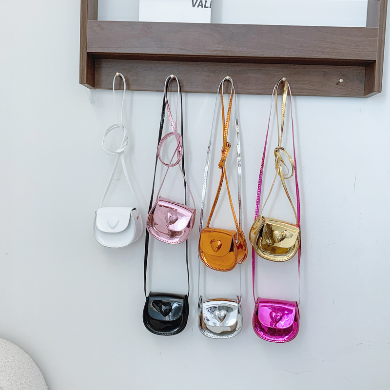 2025 nuevo bolso para niños estilo occidental mini dulce amor para niños y niñas bolso de hombro simple color sólido para niños monedero