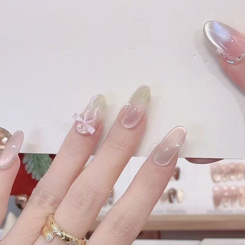 Melocotón Limina Pura hecha a mano con armadura intermitente ojo de gato degradado mariposa temperamento ligero lujo uñas de uñas removibles