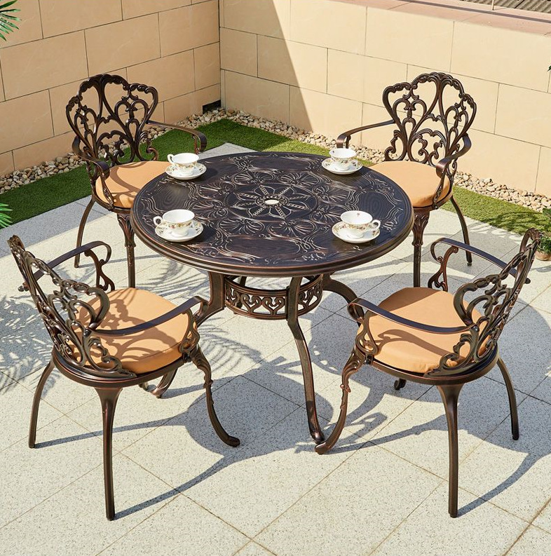 Mesas y sillas de aluminio fundido para exteriores Sillas de ocio de hierro forjado de estilo europeo Patio al aire libre Jardín Balcón Mesas y sillas Juego de aleación de aluminio