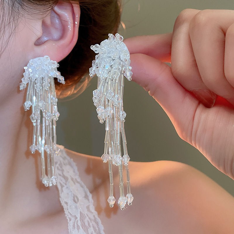 Pendientes de flor de lazo elegante de súper hada de plata Pendientes de moda de lujo ligero francés Pendientes de todo fósforo dulce de estilo literario