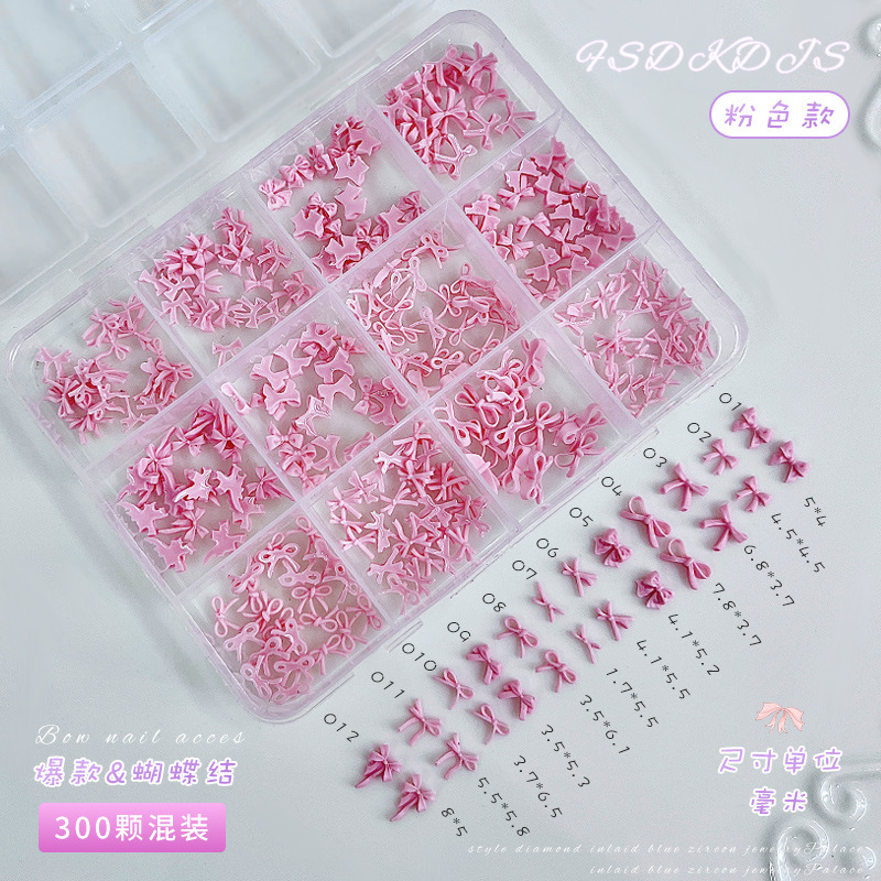 12 cuadros mini bowknot accesorios de uñas tamaño mixto estilo explosivo transfronterizo blanco y negro pajarita rosa accesorios de diamantes de uñas