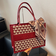 红色爱心手提大包包女式2024新款百搭大容量新娘结婚包休闲腋下包