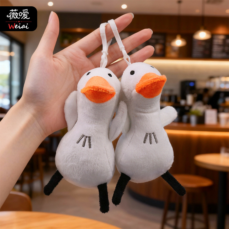 Internet Celebrity Flying Duck Plush Keychain Pendant White Duck Shake Tone Same Style Refueling Duck Doll Clothing Pendant Doll Internet Celebrity Flying Duck Plush Keychain Pendant White Duck Shake Tone Same Style Refueling Duck Doll Clothing Pendant Doll