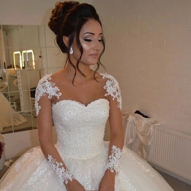 European and American Style Sheer Mesh Long-Sleeve Lace Beaded Large Ball Gown Wedding Dress with Heavy Embellishments and Sparkling Rhinestones, Palace-Style Bridal Gown European and American Style Sheer Mesh Long-Sleeve Lace Beaded Large Ball Gown Wedding Dress with Heavy Embellishments and Sparkling Rhinestones, Palace-Style Bridal Gown