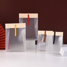 卡木龙磨砂PP手提零食糖果袋雪花酥烘焙包装袋高颜值牛轧糖自立