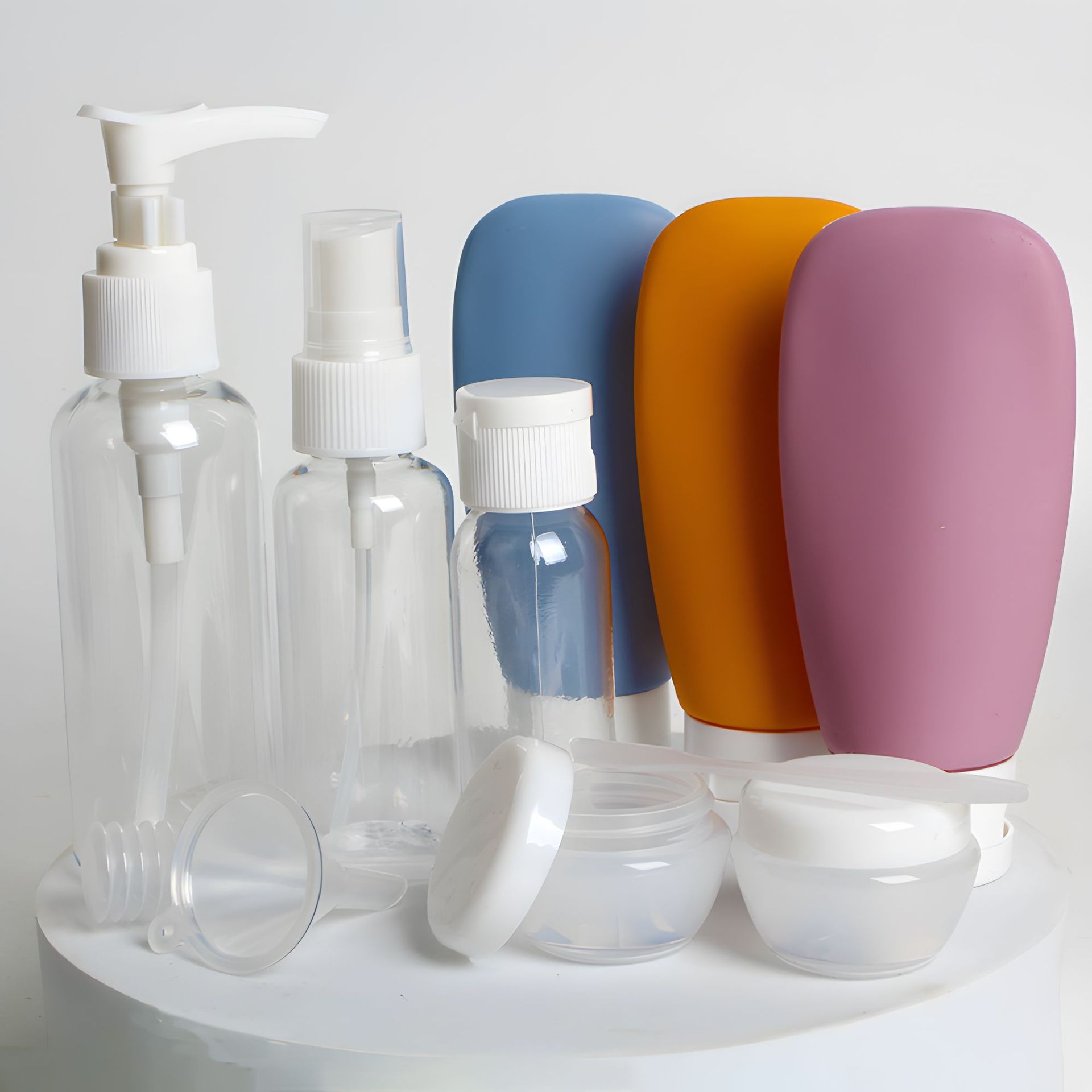 Juego de viaje de subembotellado, botella de cosméticos, botella de plástico, botella de loción, botella de champú, botella de spray, juego de once piezas