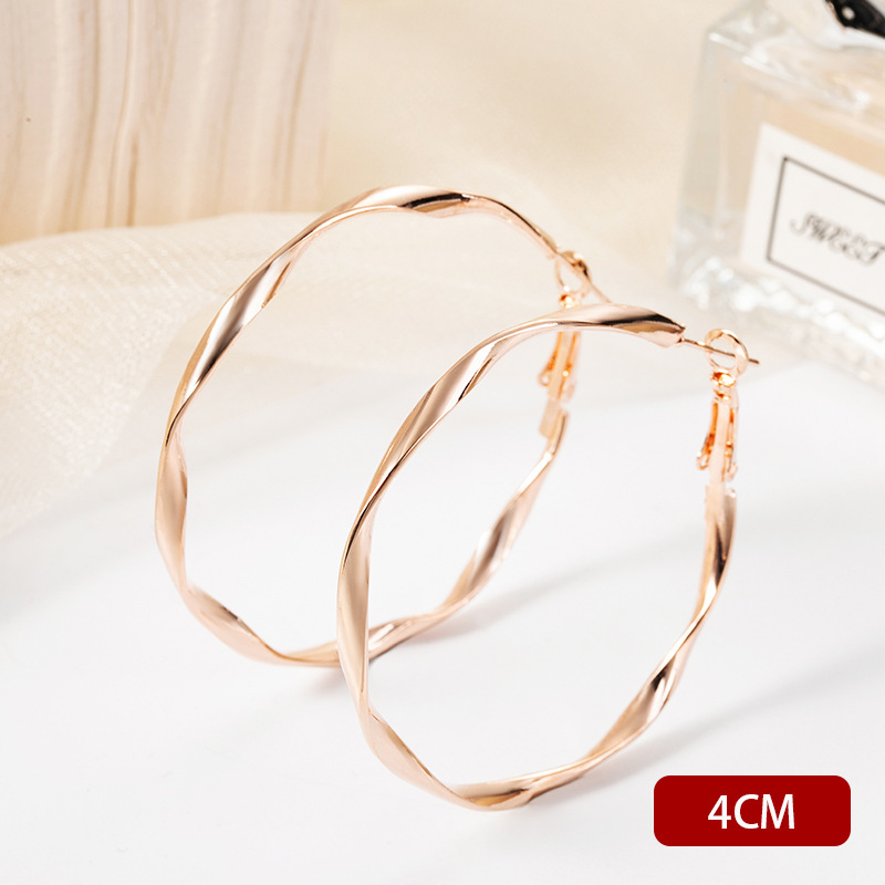 H1031 twisted earrings gold 4CM