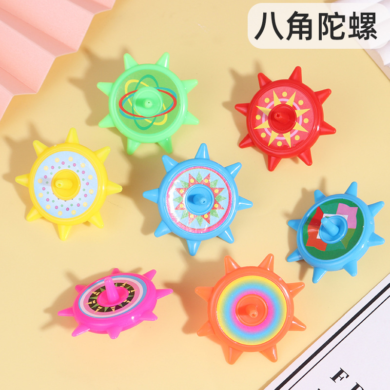Yiwu octogonal giroscopio de plástico para niños, niños y niñas, giroscopio pequeño, regalo de jardín de infantes