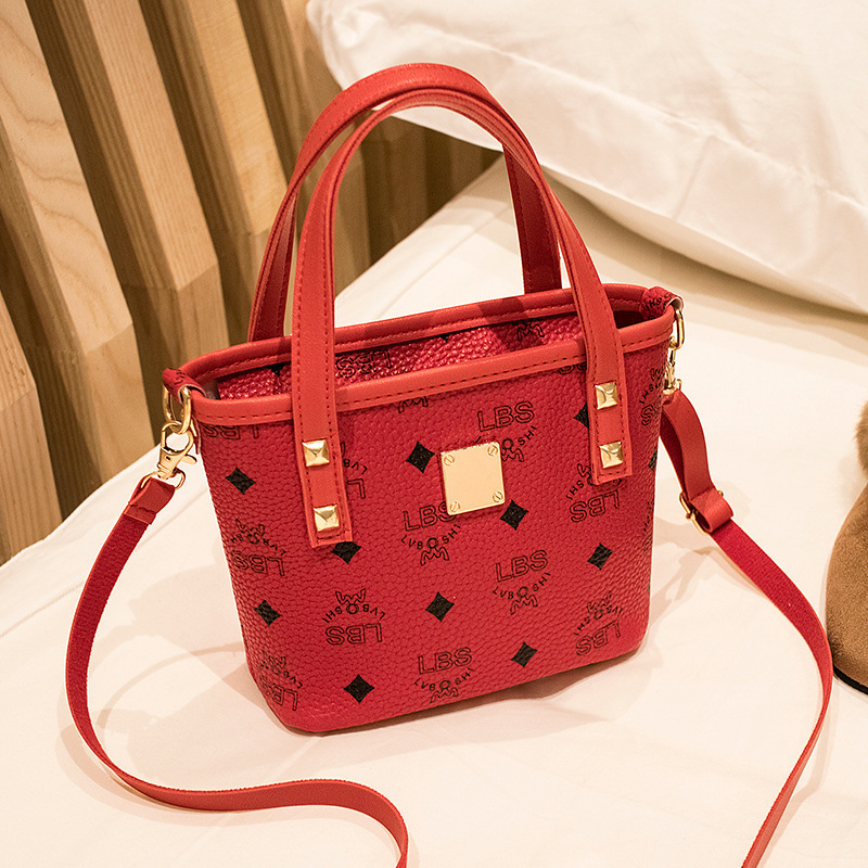 Guangzhou Bag2023 nuevo bolso de balde bolso de moda impreso bolso de mano de mujer retro bolso de hombro ocio