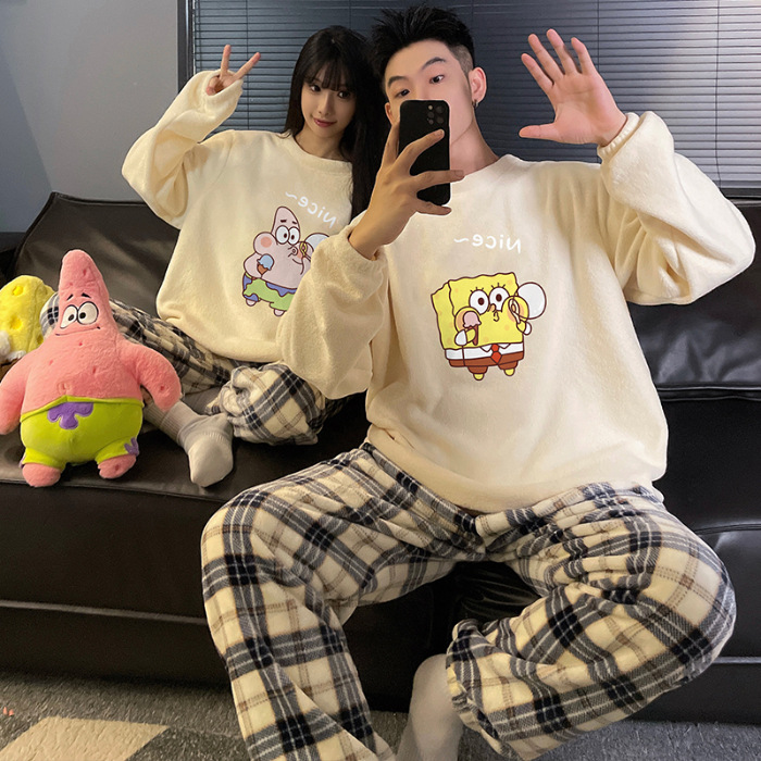 Pareja pijamas Otoño e Invierno arroz polar cuello redondo dulce de dibujos animados forrado de lana gruesa de coral cálido se puede usar fuera traje