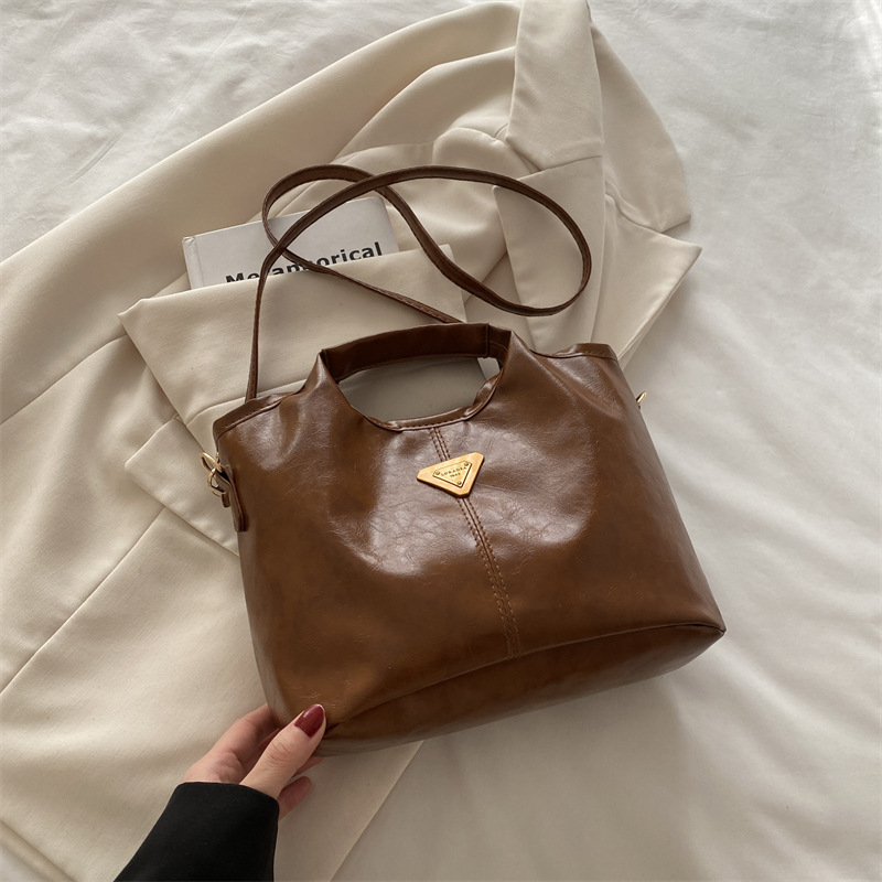 Otoño y invierno coreanos de alta calidad retro aceite de cera de cuero de moda bolso de mano nuevo estilo simple viaje mochila bolso de hombro