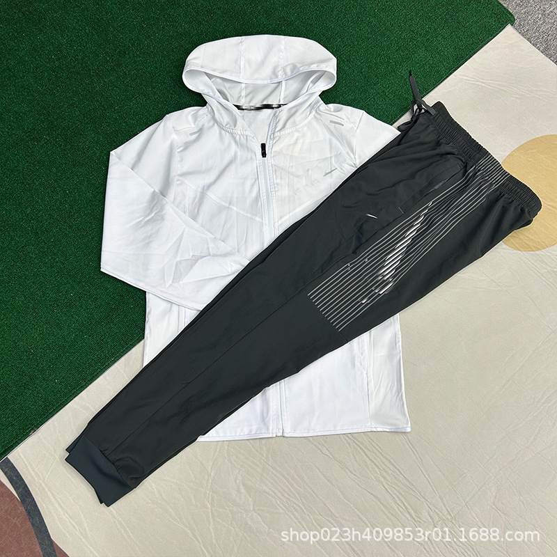 2025 nuevo conjunto de otoño y invierno pantalones de seda de secado rápido chaqueta deportiva con cremallera con capuchón protector solar para hombres y mujeres