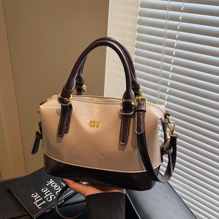 Nicho Zhong bolso de mano de tendencia retro mujer 2025 nuevo paquete de hombro casual universal viaje de alta calidad sensación de mochila