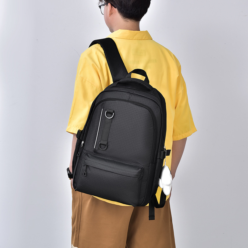 Nueva mochila coreana para hombres y mujeres, mochila de estudiantes a cuadrícula japonesa, pareja casual, mochila de viaje de moda de gran capacidad