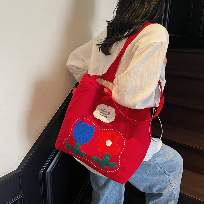 2025 夏の新スタイルナイロン刺繍巾着トートバッグ女性の韓国スタイルリラックスニッチ大容量ショルダーバッグ|undefined