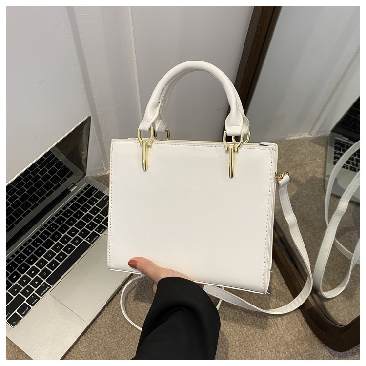 Alta textura moda simple hilo de coser bolsa personalizada bolso de las mujeres 2023 invierno nuevo todo-fósforo crossbody bolso de hombro