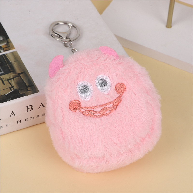 B116 Monster llavero - polvo de ojos grises dobles