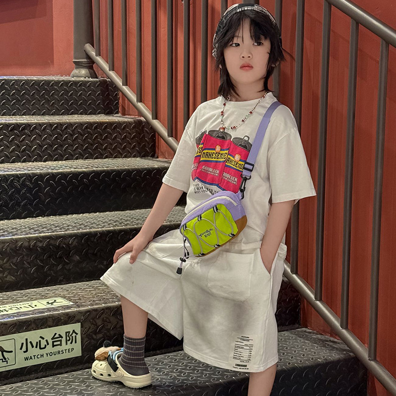 2026 versión coreana de la cuerda extranjera, bolsas de hombro para hombres y mujeres, bolsas de hombro ligeras y compactas, bolsas de hombro de color, nuevas bolsas de niños transfronterizas