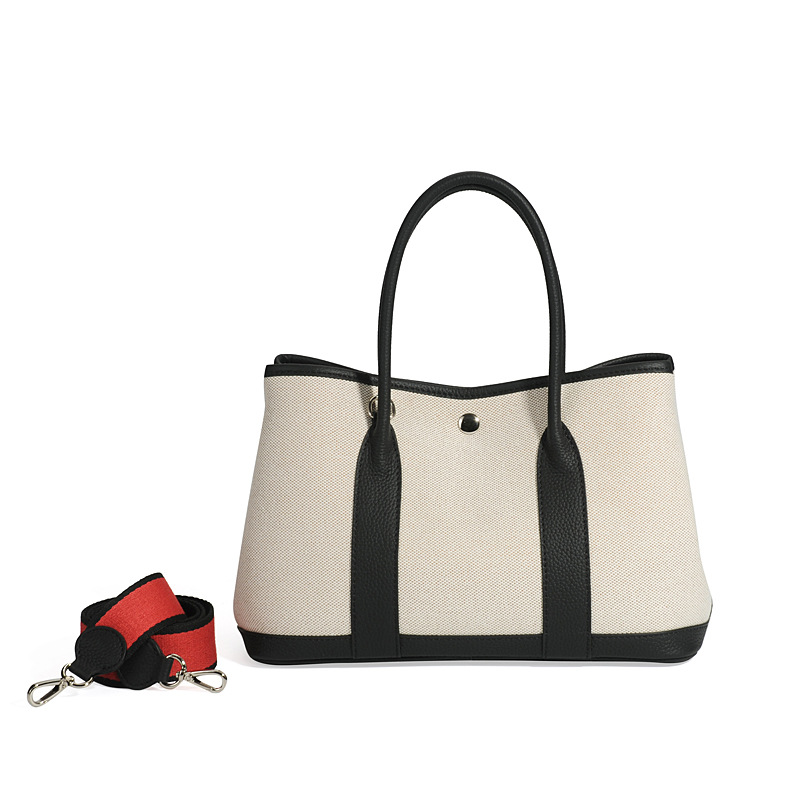 大容量ガーデンバッグキャンバスは色にぶつかった本革のトップ層牛革をつなぎ合わせて、シングル肩のショッピングバッグを持っています。