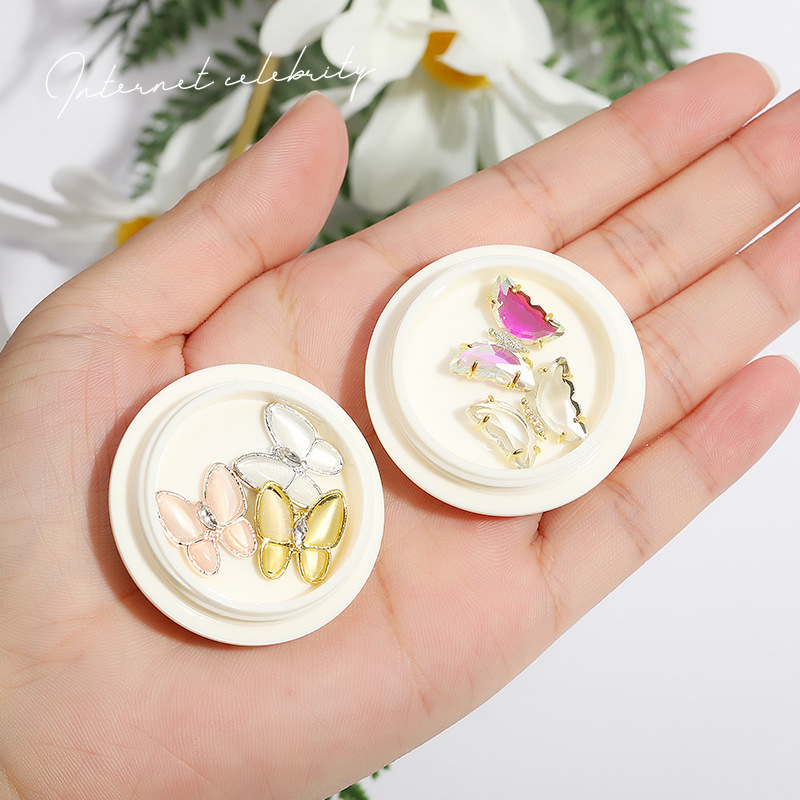 Online popular hielo transparente Aurora mariposa joyería cristal blanco piedra tridimensional uñas diamante Super Flash rhinestone uñas joyería