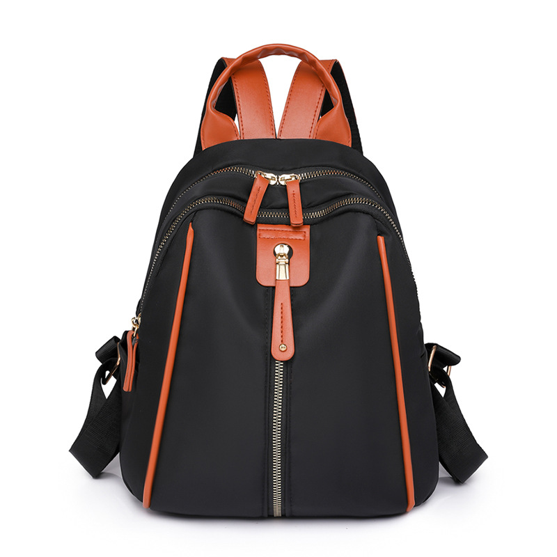Mochila de nailon para mujer 2024 nueva moda anti-salpicaduras para mujer mochila de concha estilo occidental bolso de viaje de ocio
