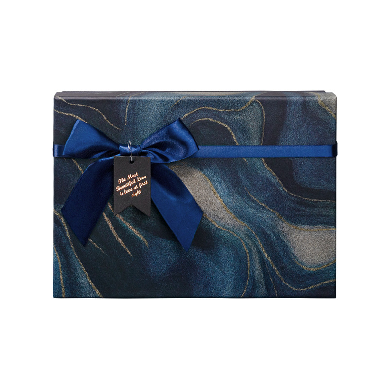 2025 nueva caja de regalo de arco de alto nivel de sensación de cubierta de embalaje bufandas caja de regalo de cumpleaños fabricantes al por mayor