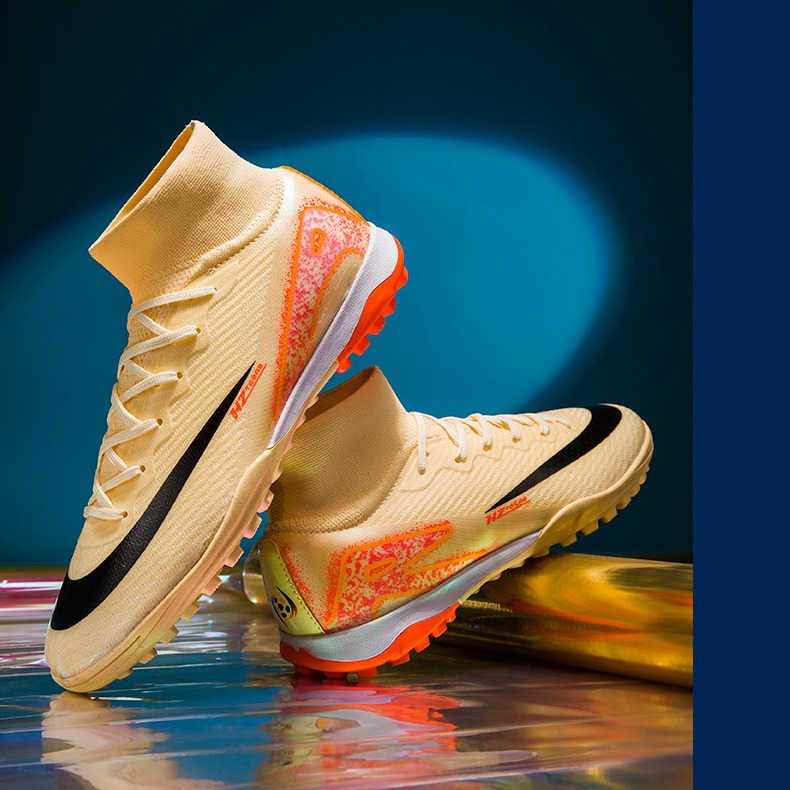 Al por mayor transfronterizo nuevos zapatos de fútbol de alto nivel para estudiantes de la Copa del Mundo de entrenamiento de césped con clavos rotos tecnología de ventilación