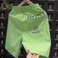 夏の外着のごろつきのかっこいい速乾の半ズボンの男性の薄い金の通気の5分のビーチのズボンのファッションの弾力のまっすぐな筒のカジュアルなズボン