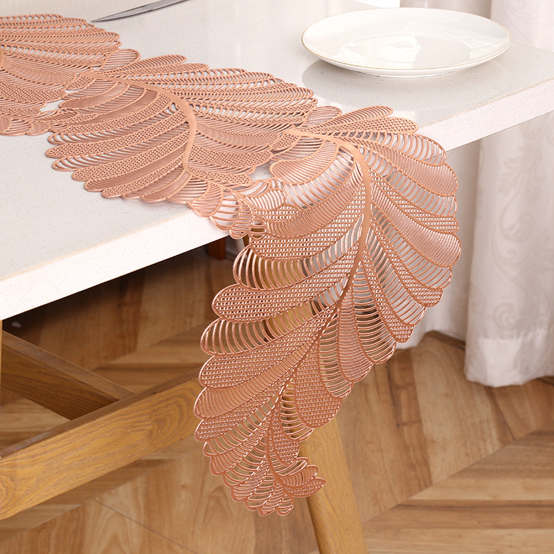 Alfombrilla de mesa simple de lujo ligero europea y americana, impermeable y a prueba de aceite, almohadilla de aislamiento térmico de PVC, sentido avanzado, bandera de mesa de viento INS al por mayor