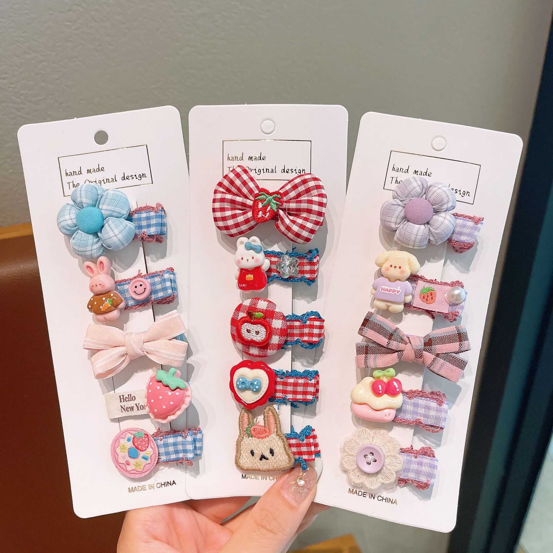 Nuevo pequeño botón de metal perfumado para niños anillo de cabello personalidad widgets niñas atar cabello cuerdas de cabello adornamientos para el cabello