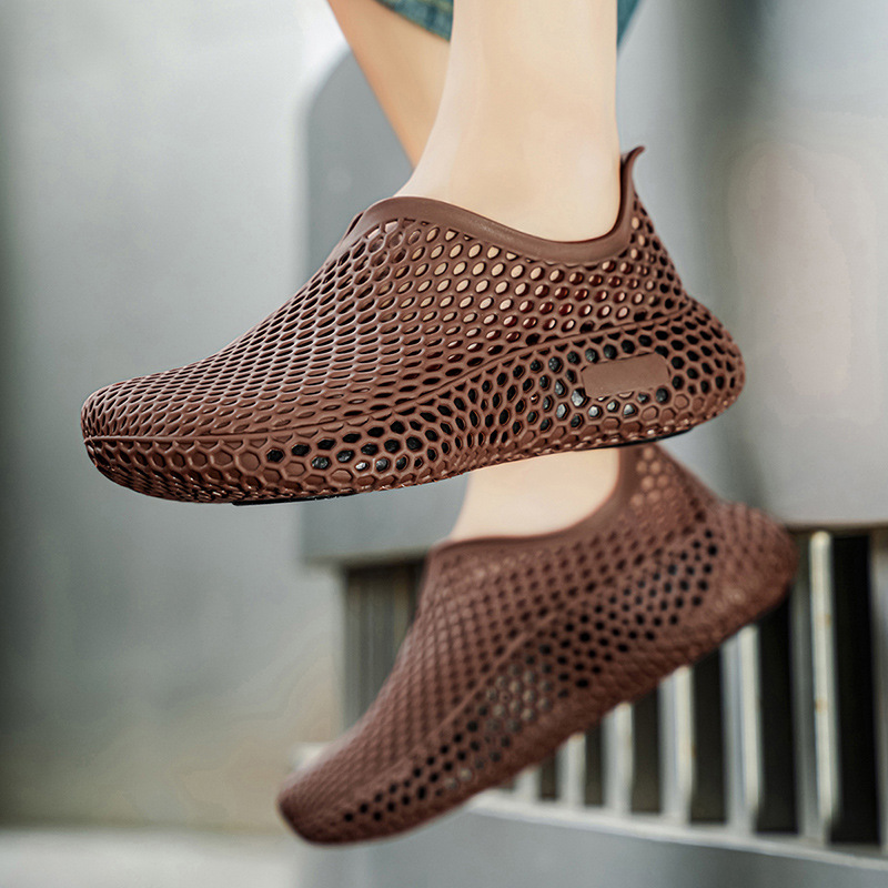 Cross-border 2026 nuevo verano al aire libre integrado sandalias de explosión deportivo transpirable zapatos de playa antideslizantes zapatos de agujero para hombre
