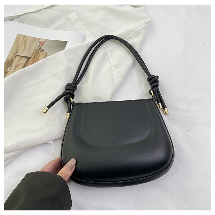 Textura color caramelo nuevo bolso femenino portátil moda moda bolso de hombro estilo occidental bolso de axila simple bolso de silla dulce