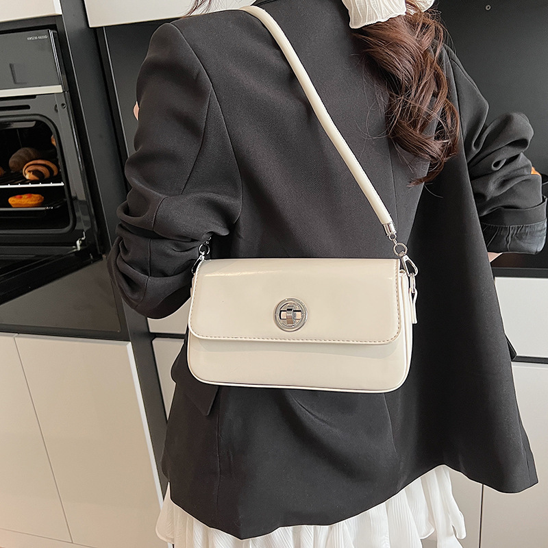 Bolso de axila de moda coreana 2025 primavera y verano nuevo bolso femenino bolso de hombro de alta calidad bolso de mensajero simple casual marea