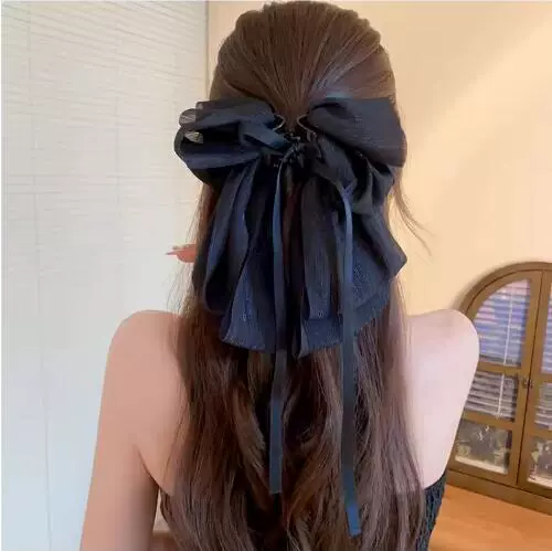 Black ponytail with bow, crab pin
