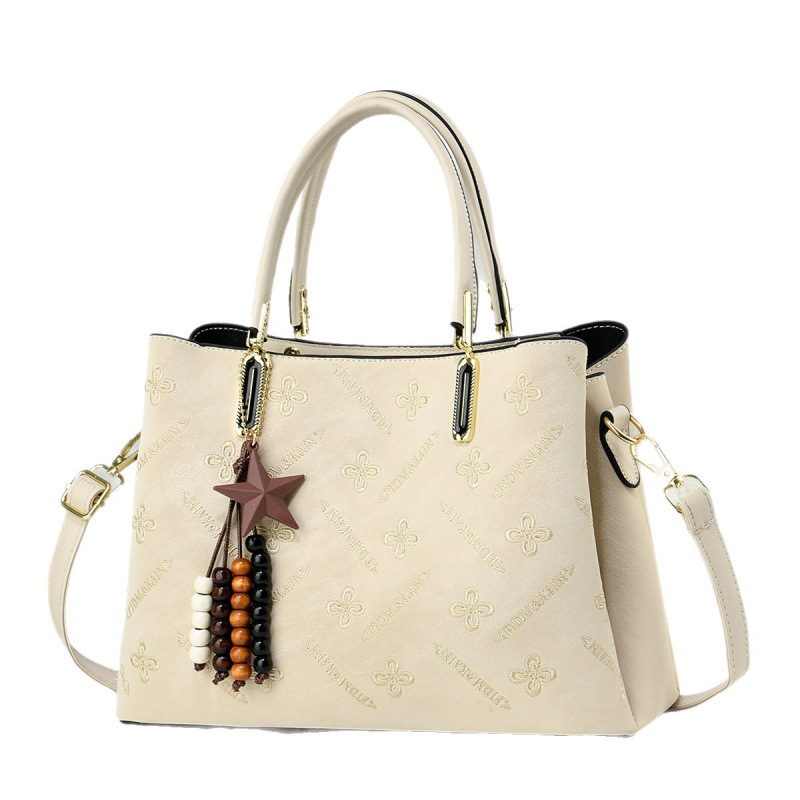 Hermosas estrellas colgantes bolsos de mano diarios ociosos de moda mochilas temperamento versátil bolsos de hombro Handbag