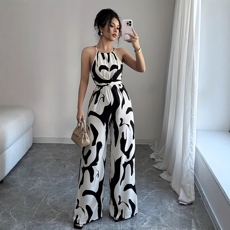 2026 Women's Clothing Wholesale: Waist-Cinching, Slimming, Loose-Fitting Black and White Milk Pattern Printed Halter Neck Wide-Leg Jumpsuit for Women