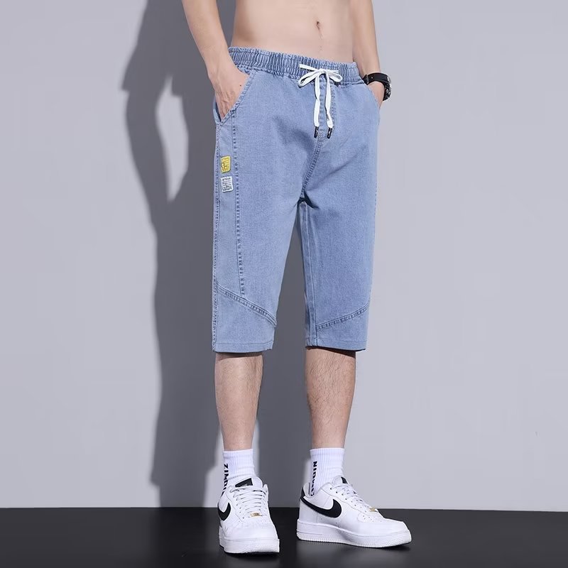 Moda de mezclilla de verano tendencia de los hombres sueltos rectos tallas grandes pantalones recortados marca de moda de los hombres pantalones medios de 7 puntos estilo fino de verano